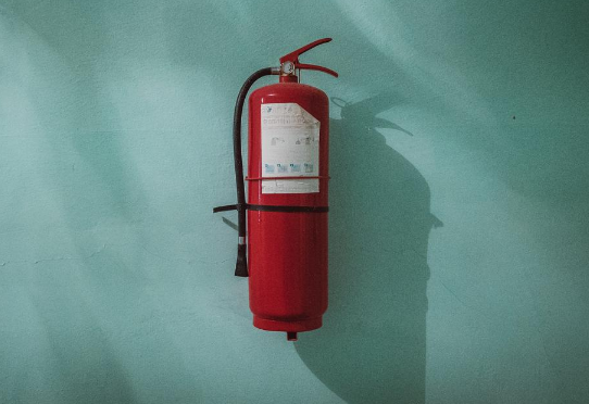 Fire extinguisher - Photo by Piotr Chrobot on Unsplash
